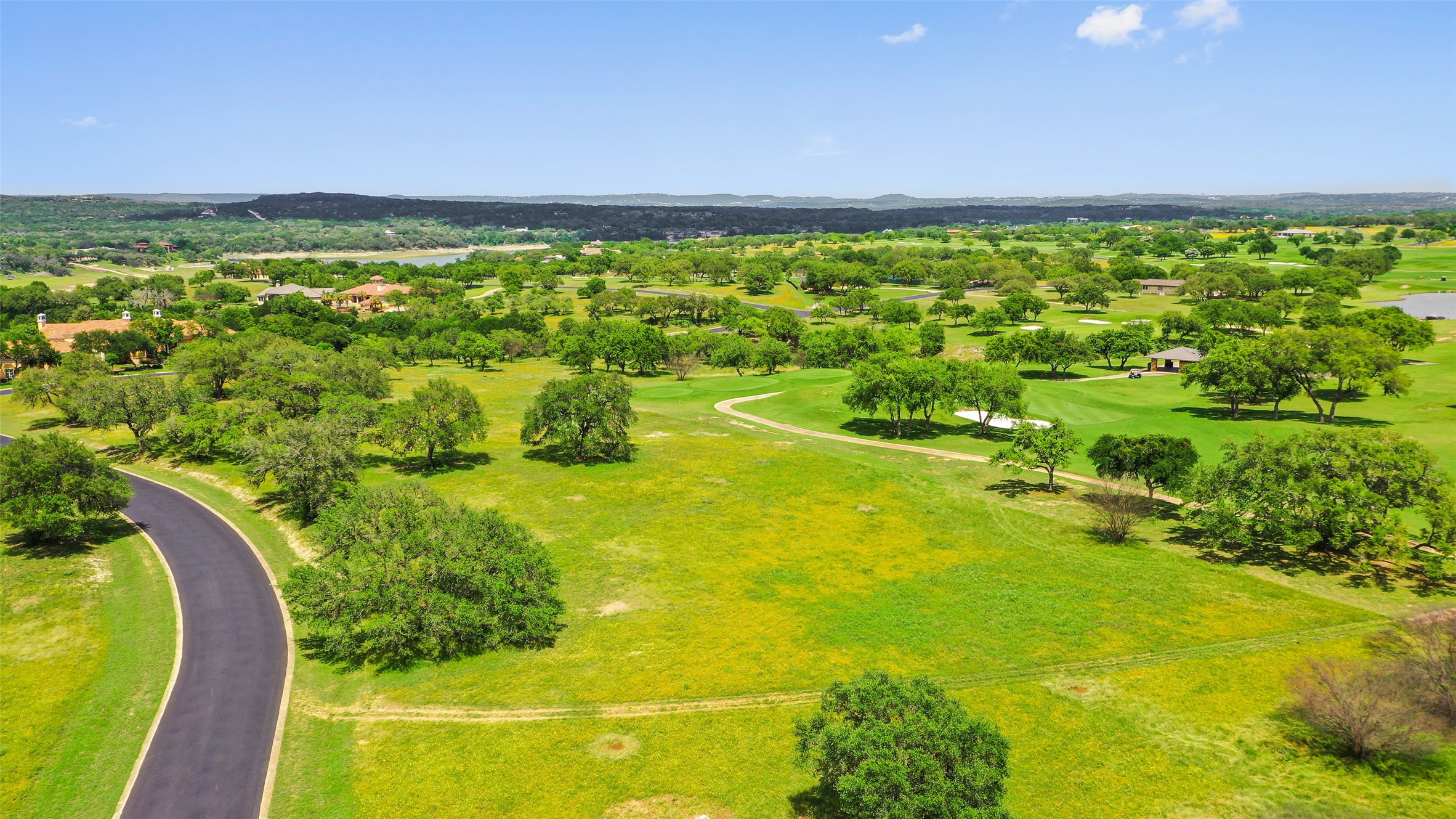 2711 Cliff Point Spicewood, TX 78669 - Photo 9 of 22 a view of an outdoor space and a lake view