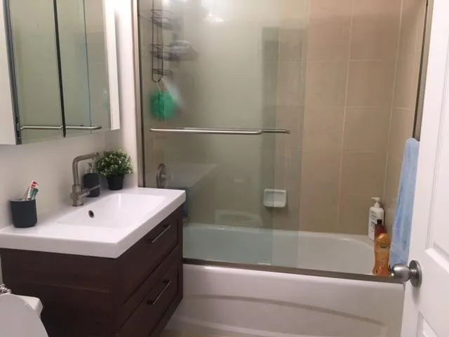 a bathroom with a sink and a bathtub