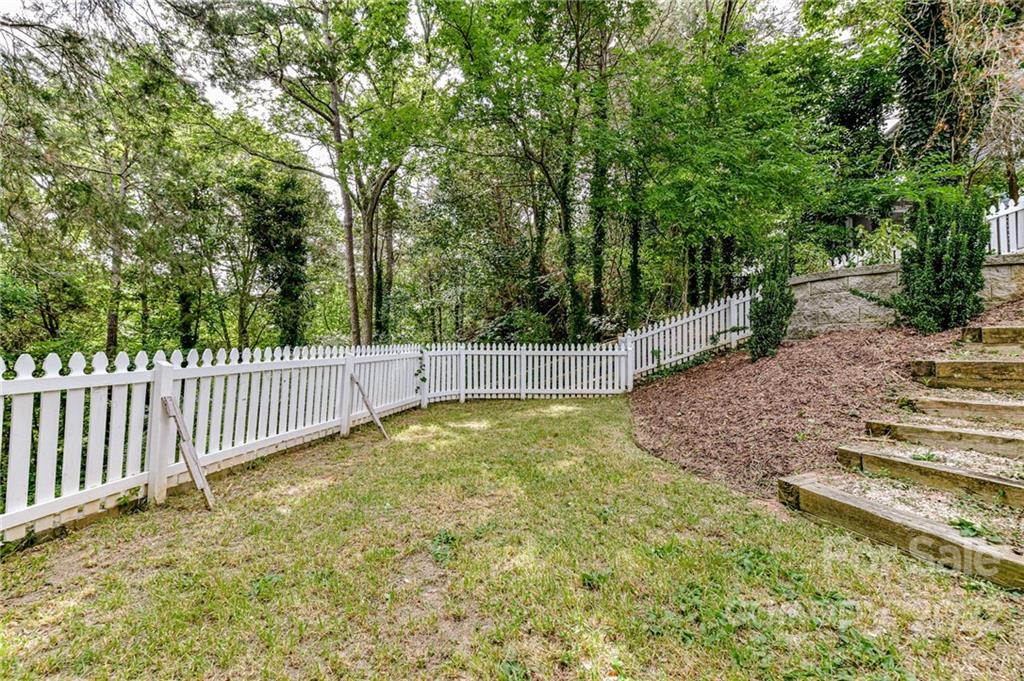 113 Morrison Hill Road Davidson, NC 28036 - Photo 24 of 27 a view of a backyard with fence
