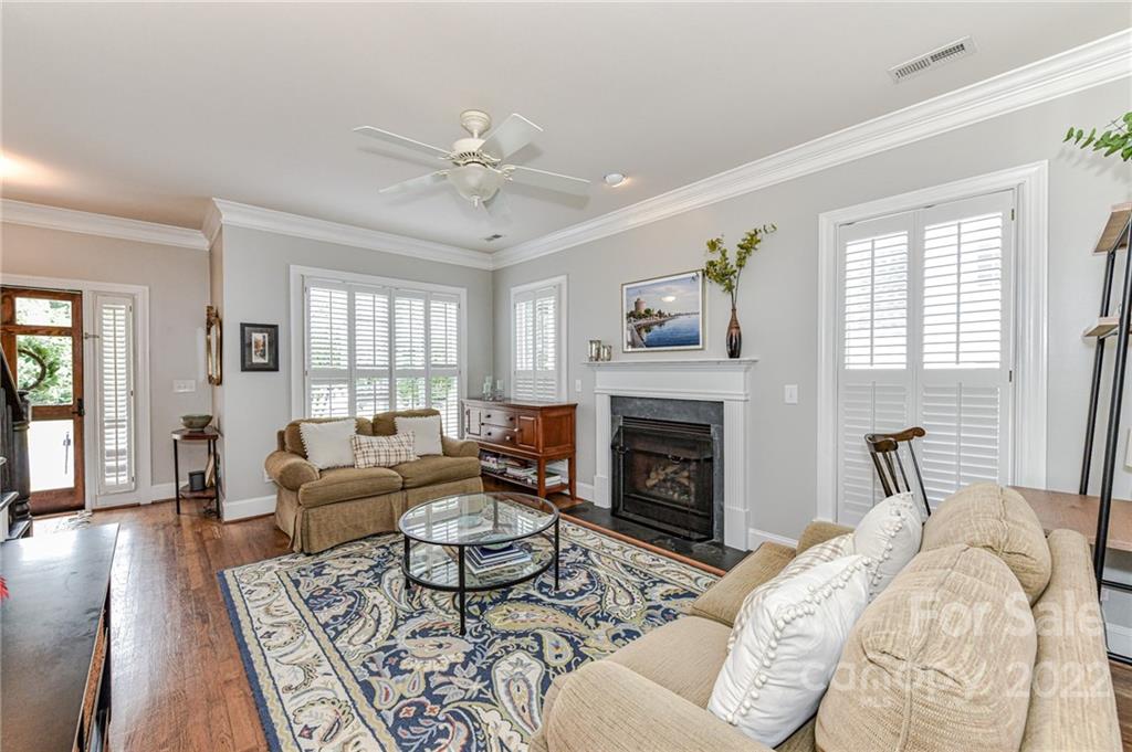 113 Morrison Hill Road Davidson, NC 28036 - Photo 4 of 27 a living room with furniture fireplace and window