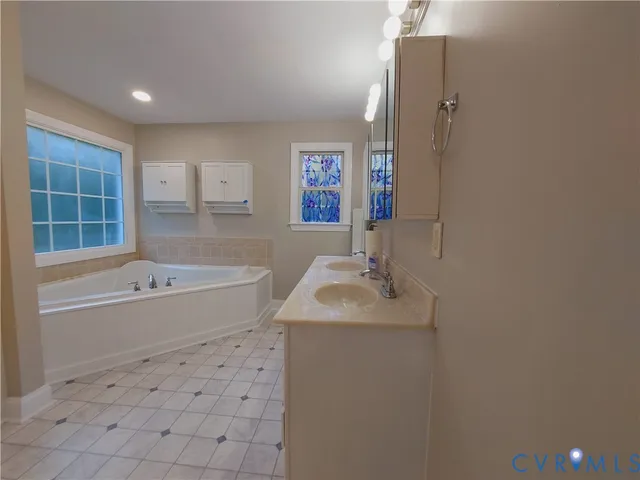 a bathroom with a sink and a bathtub