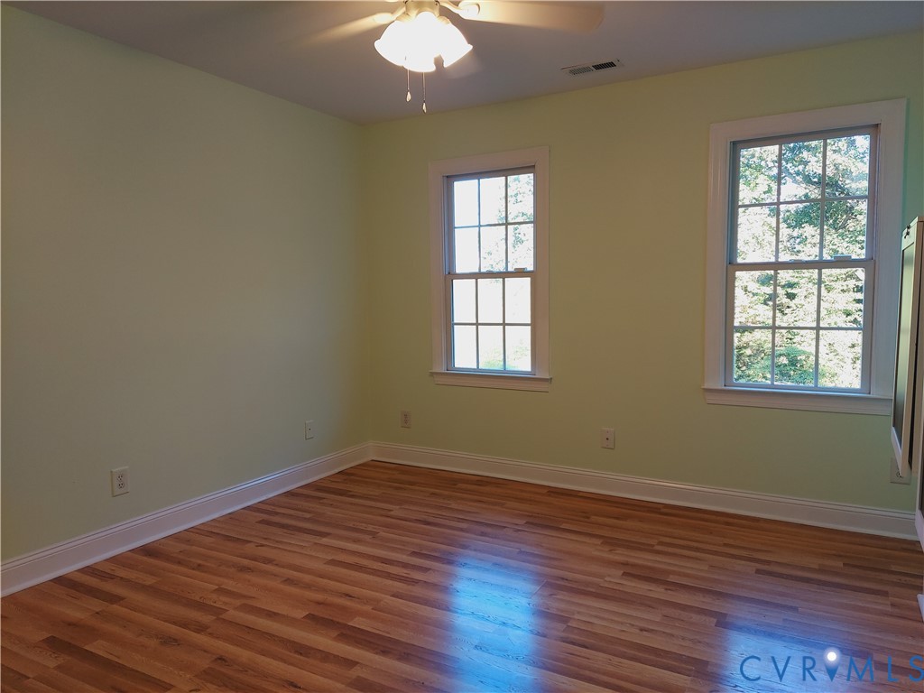 18313 Shiloh Church Road Beaverdam, VA 23015 - Photo 20 of 39 a view of a room with wooden floor and windows