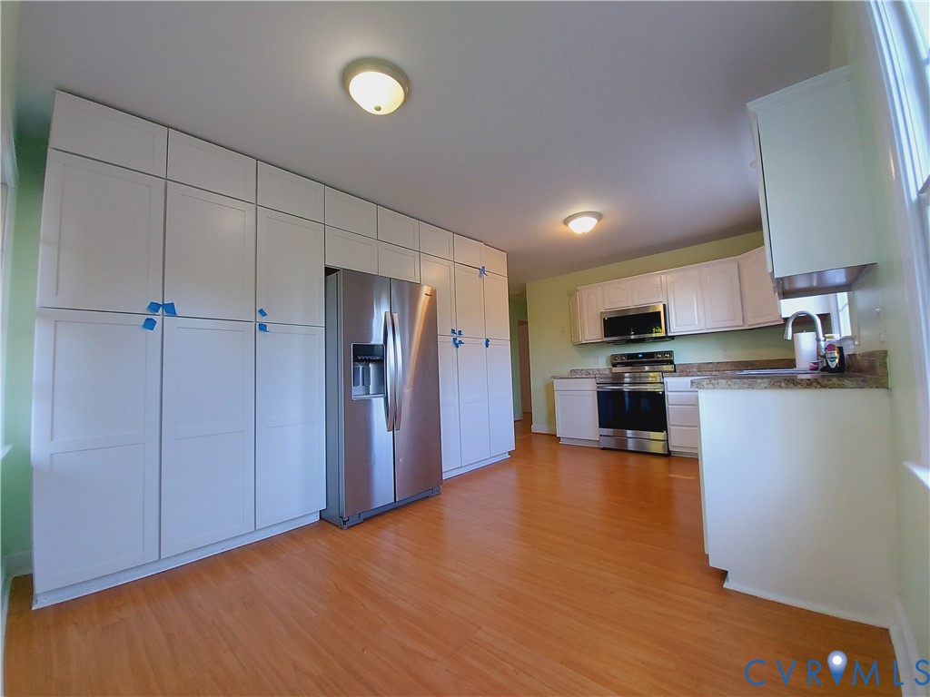 18313 Shiloh Church Road Beaverdam, VA 23015 - Photo 8 of 39 a view of kitchen with wooden floor