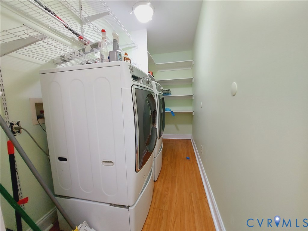 18313 Shiloh Church Road Beaverdam, VA 23015 - Photo 10 of 39 a view of a storage & utility room with washer and dryer