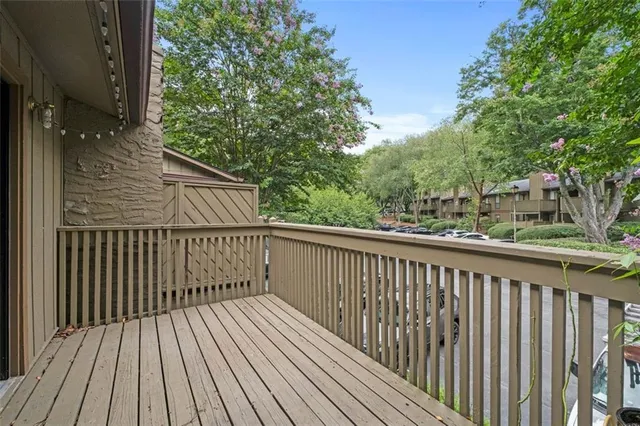 a view of outdoor space with deck and furniture