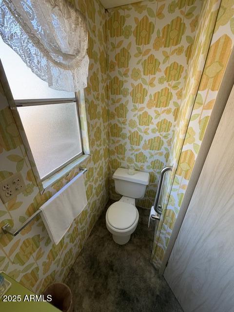 9501 East Broadway Road, Unit 119 Mesa, AZ 85208 - Photo 12 of 24 a bathroom with a sink and a toilet