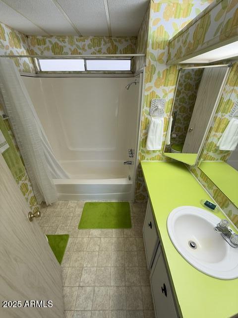 9501 East Broadway Road, Unit 119 Mesa, AZ 85208 - Photo 14 of 24 a bathroom with a sink and a mirror