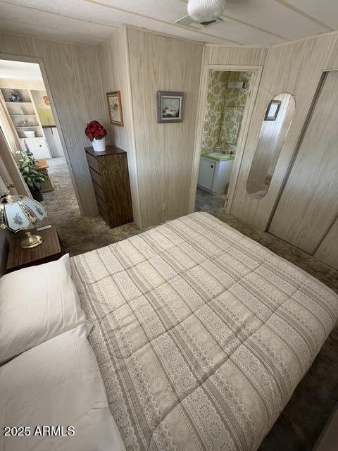 9501 East Broadway Road, Unit 119 Mesa, AZ 85208 - Photo 10 of 24 a bedroom with a bed and a mirror