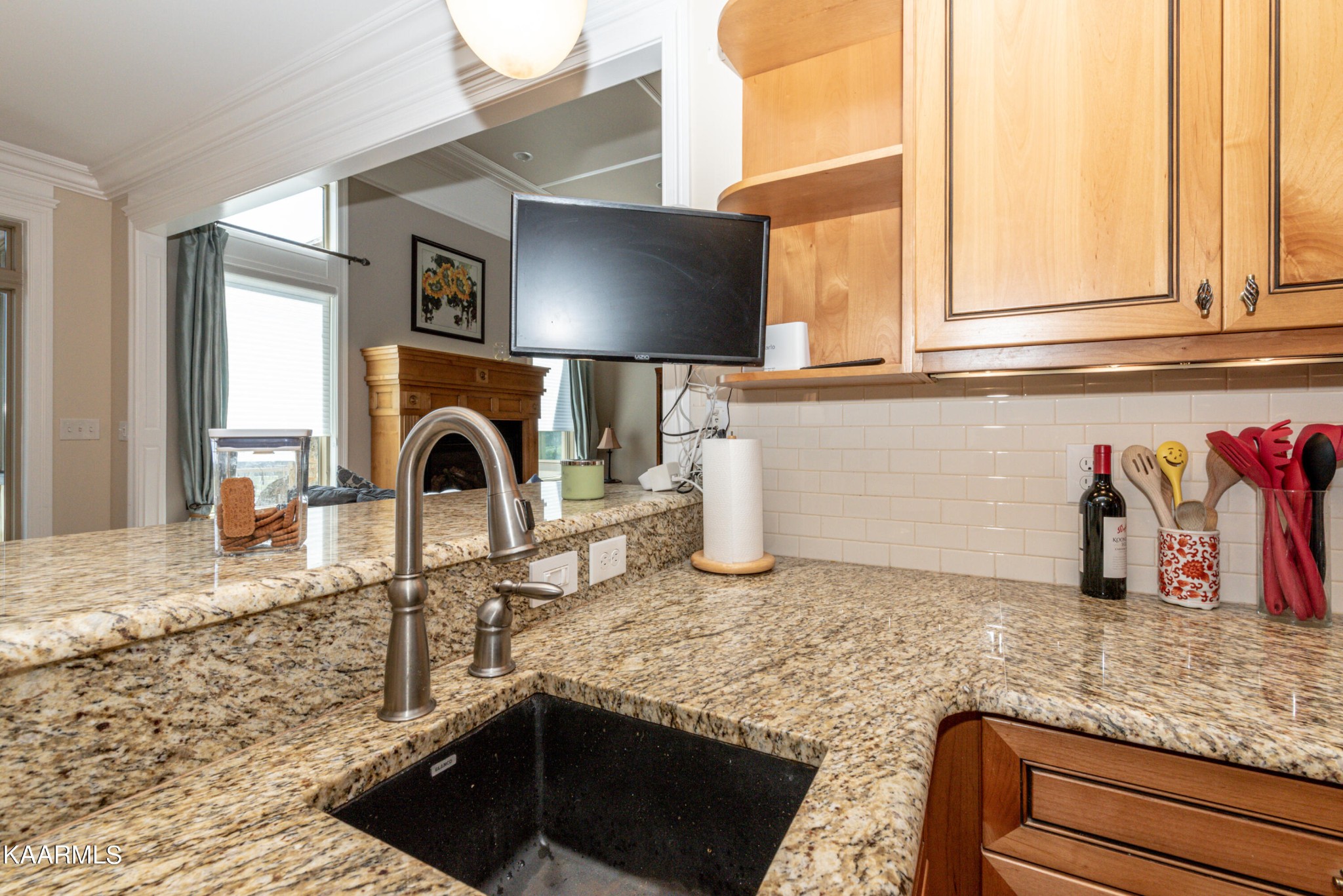 6069 Morganton Road Greenback, TN 37742 - Photo 30 of 60 a kitchen with granite countertop a sink stainless steel appliances and cabinets