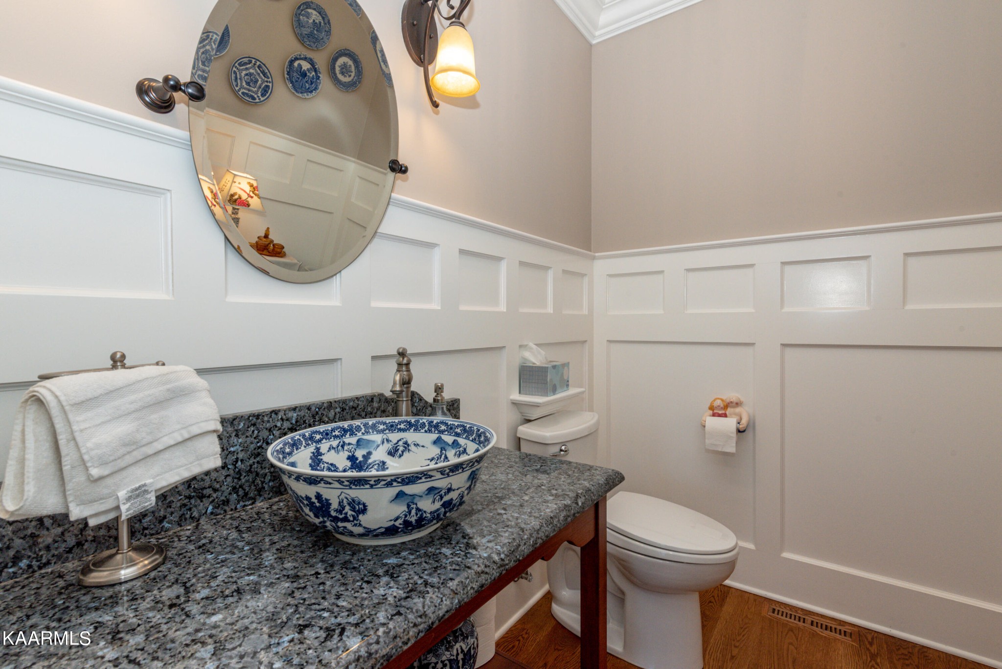 6069 Morganton Road Greenback, TN 37742 - Photo 36 of 60 a bathroom with a granite countertop sink and a mirror