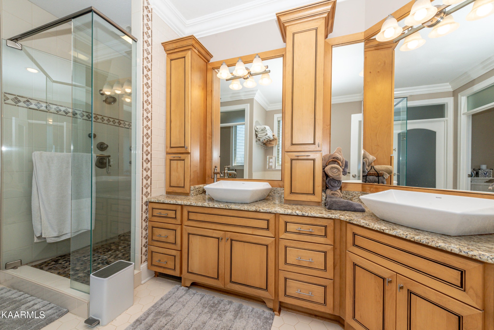 6069 Morganton Road Greenback, TN 37742 - Photo 40 of 60 a spacious bathroom with a double vanity sink and a mirror