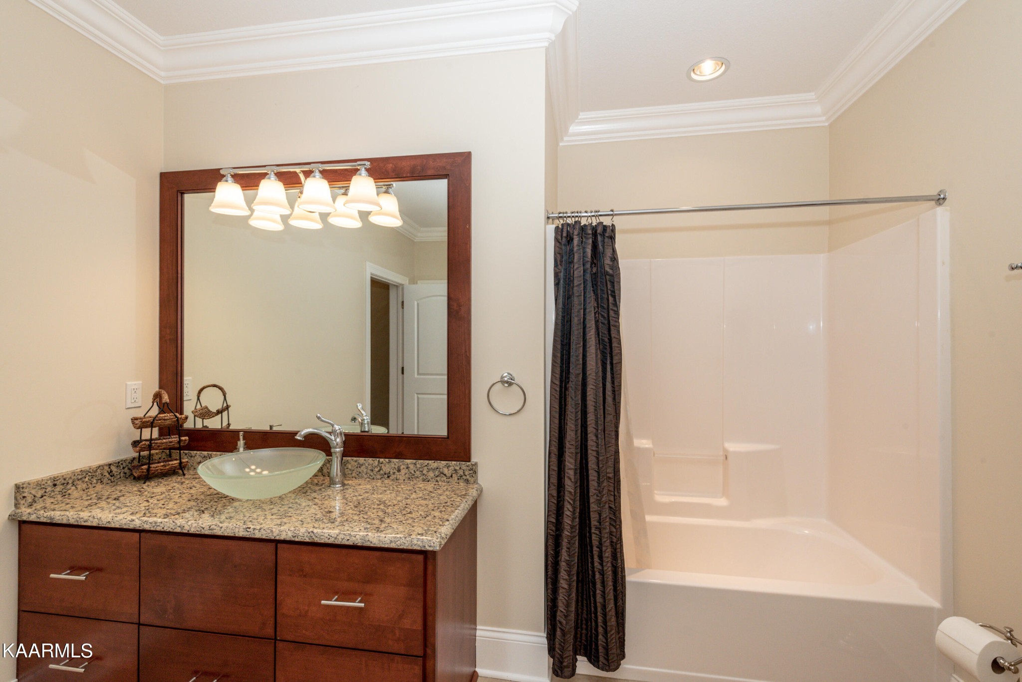 6069 Morganton Road Greenback, TN 37742 - Photo 49 of 60 a bathroom with a granite countertop sink and a mirror