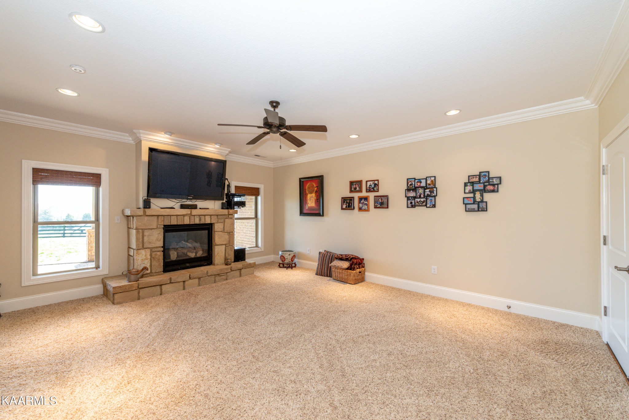 6069 Morganton Road Greenback, TN 37742 - Photo 51 of 60 a view of a livingroom with a fireplace a window and a couch