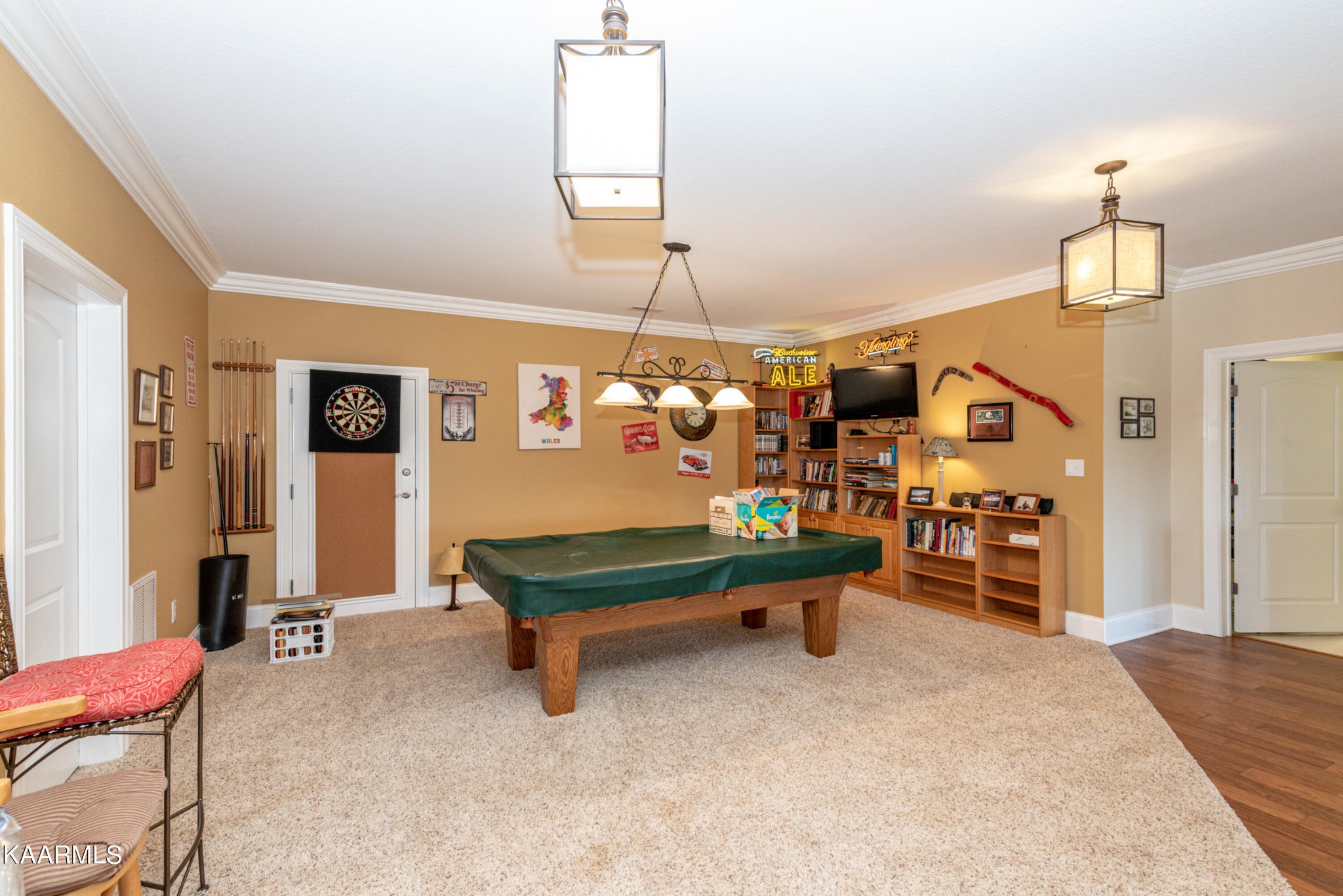 6069 Morganton Road Greenback, TN 37742 - Photo 52 of 60 a room with lots of white furniture and a chandelier