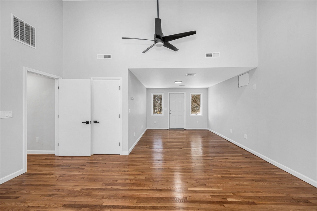 52 Elm Street Haverhill, MA 01830 - Photo 15 of 40 a view of empty room with wooden floor