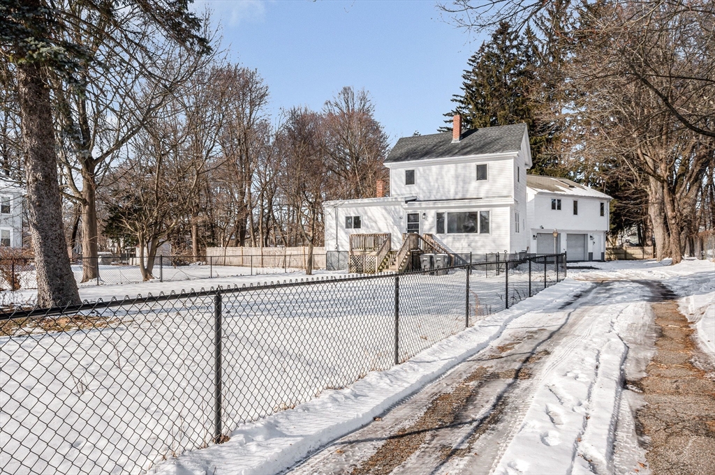 52 Elm Street Haverhill, MA 01830 - Photo 2 of 40 a view of a park with large trees