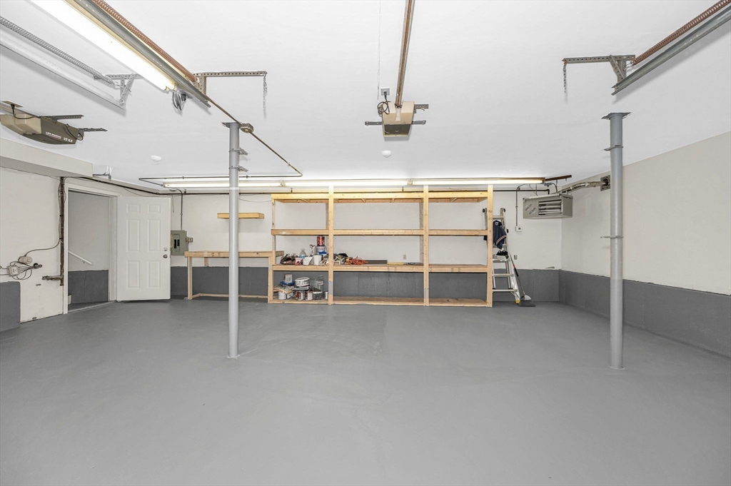 52 Elm Street Haverhill, MA 01830 - Photo 30 of 40 a view of a livingroom with an furniture and fireplace