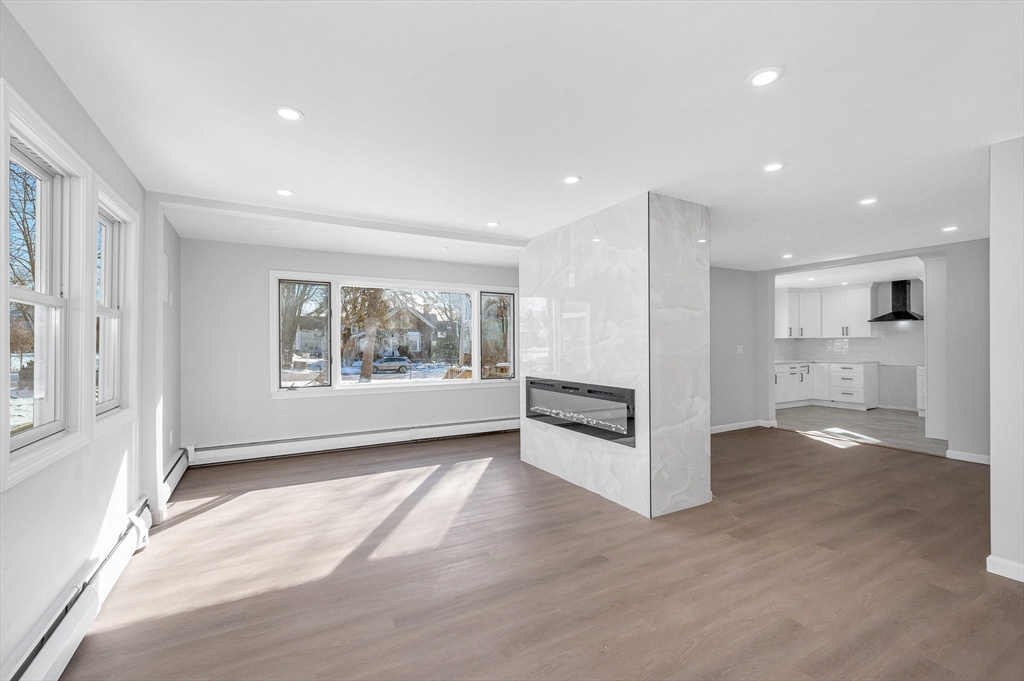 52 Elm Street Haverhill, MA 01830 - Photo 4 of 40 a view of entryway with kitchen and windows