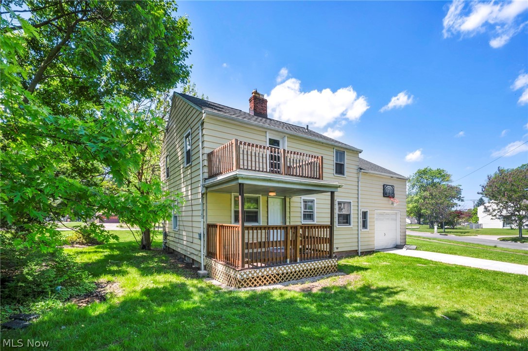 2313 North Taylor Road Cleveland Heights, OH 44112 - Photo 29 of 32 Two-story residence featuring a ground-level porch and an upper-level balcony, both with wood railings