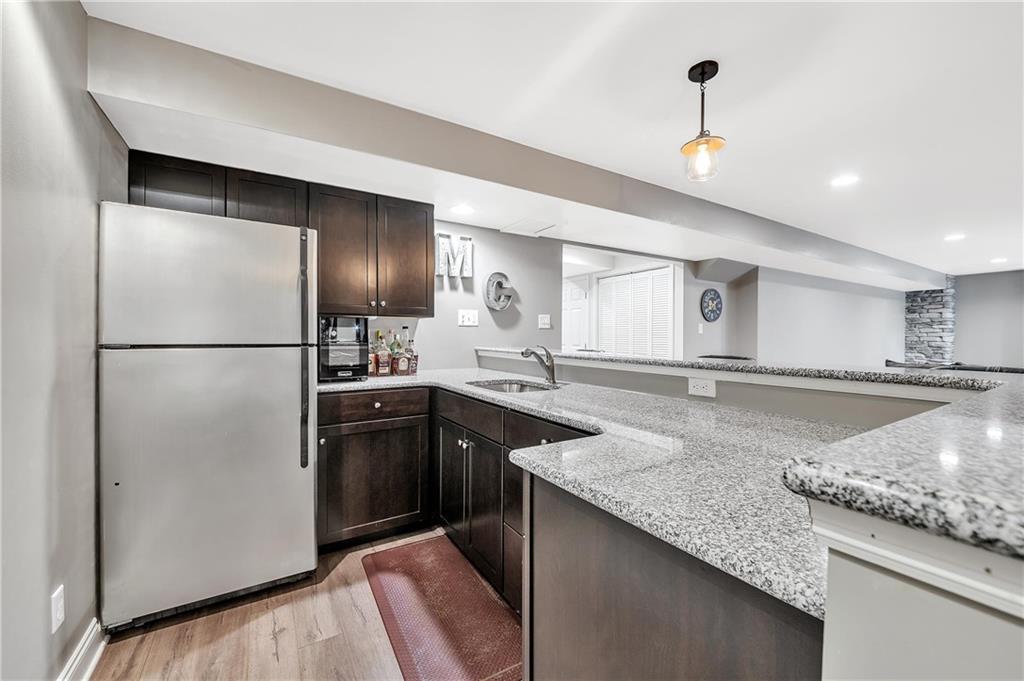 896 Ashley Road Gibsonia, PA 15044 - Photo 19 of 25 a kitchen with stainless steel appliances granite countertop a refrigerator a sink and a stove