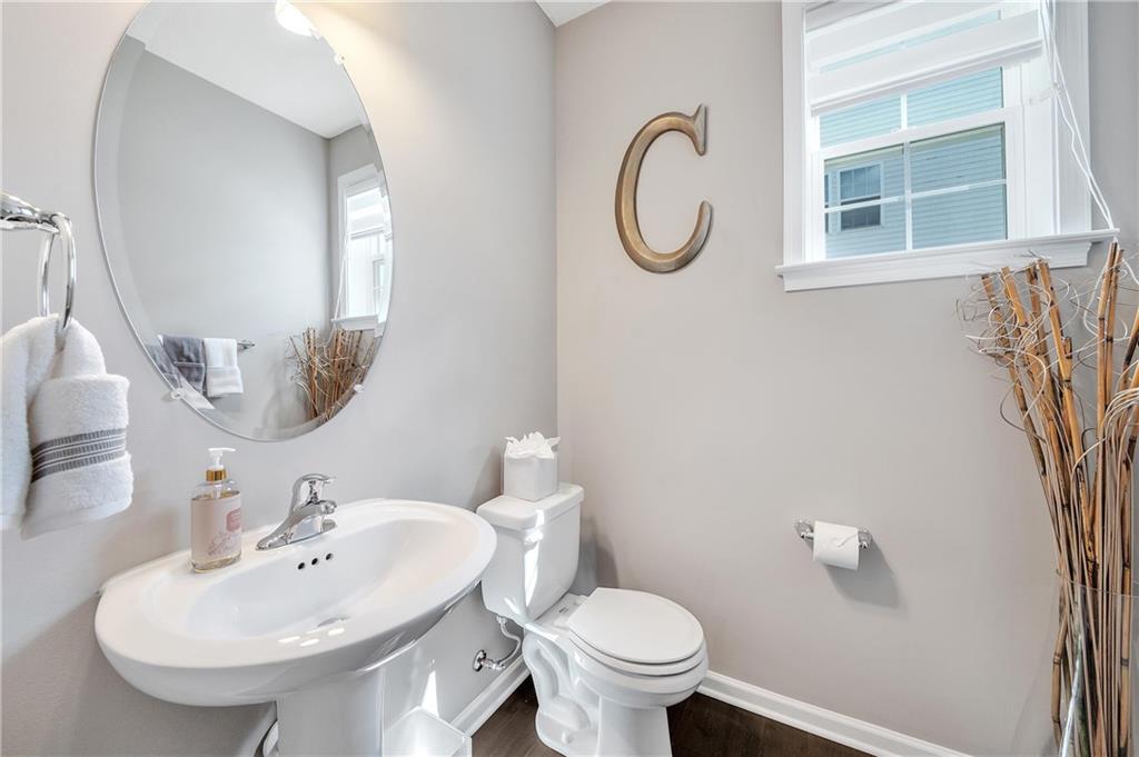 896 Ashley Road Gibsonia, PA 15044 - Photo 10 of 25 a bathroom with a sink and a toilet