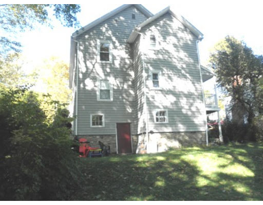 53 Harvard Street Extension Natick, MA 01760 - Photo 3 of 11 a view of house with yard