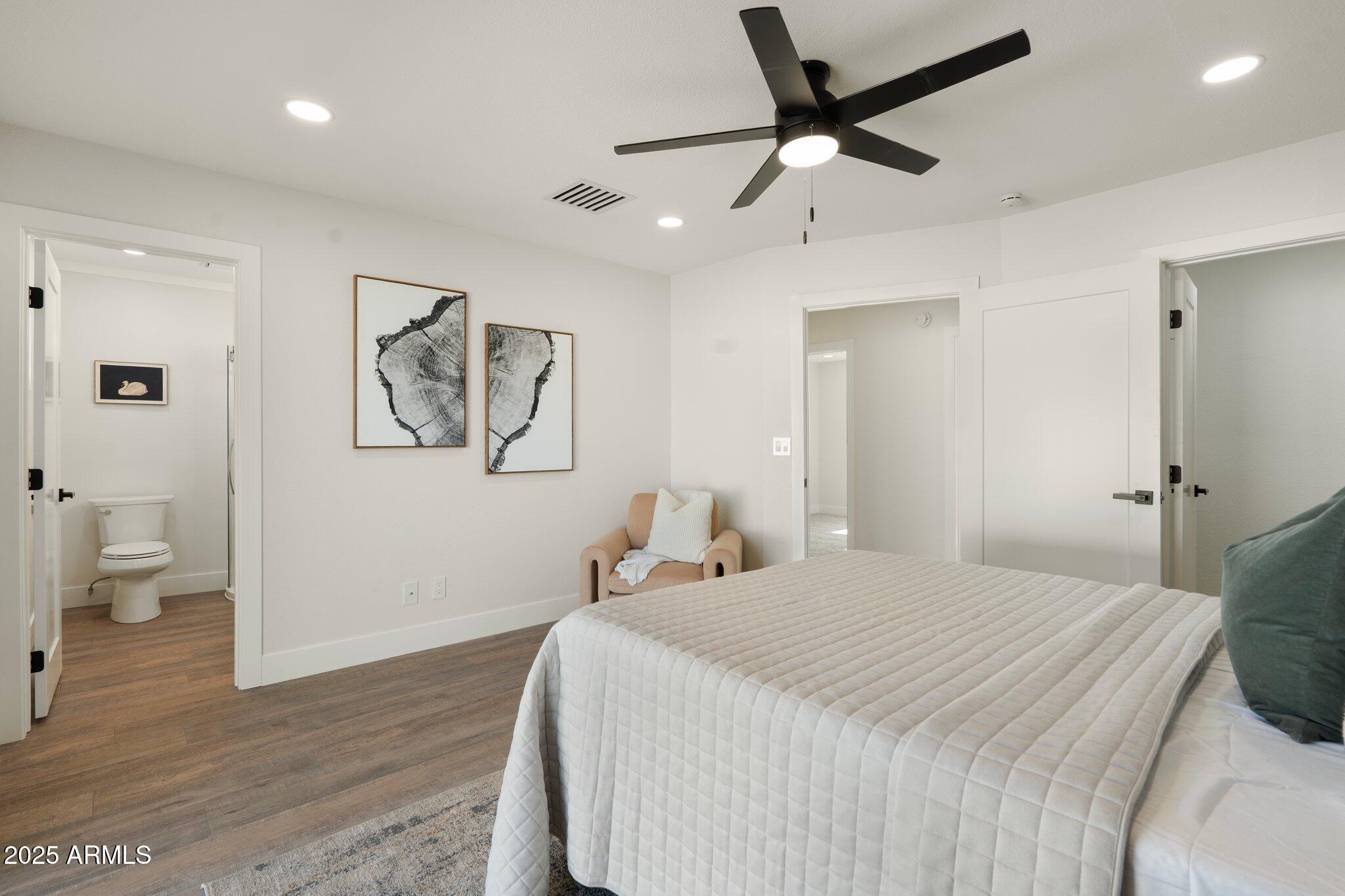 1721 North Apache Drive Chandler, AZ 85224 - Photo 13 of 22 a bedroom with a bed and painting on the wall