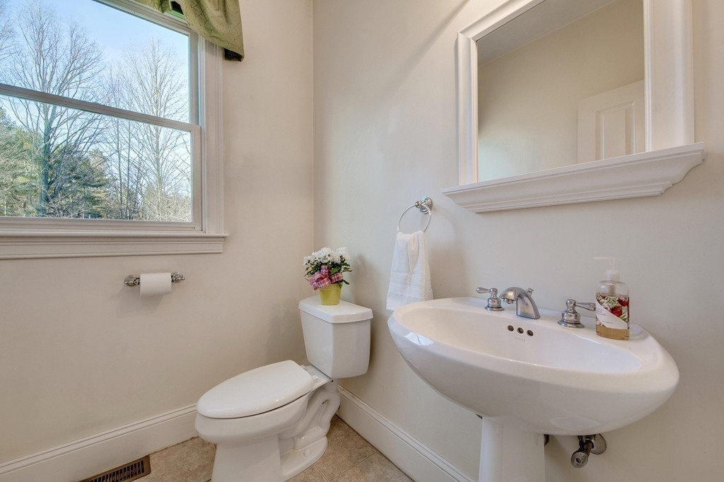 311 Still River Road Harvard, MA 01451 - Photo 12 of 27 a bathroom with a sink and a toilet