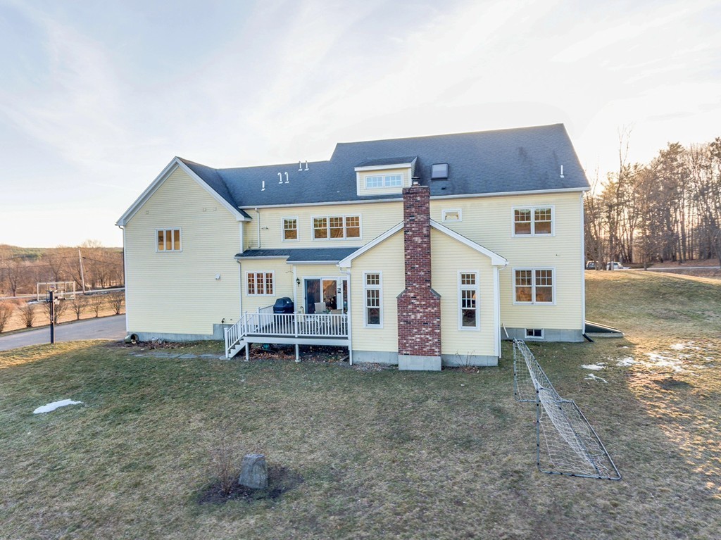 311 Still River Road Harvard, MA 01451 - Photo 26 of 27 front view of a house with a yard