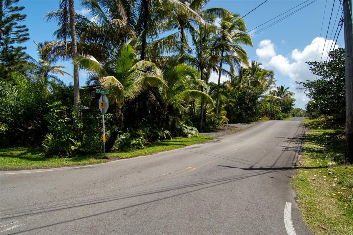1401 3rd Avenue Keaau, HI 96749 - Photo 13 of 30 a backyard of a house with lots of green space