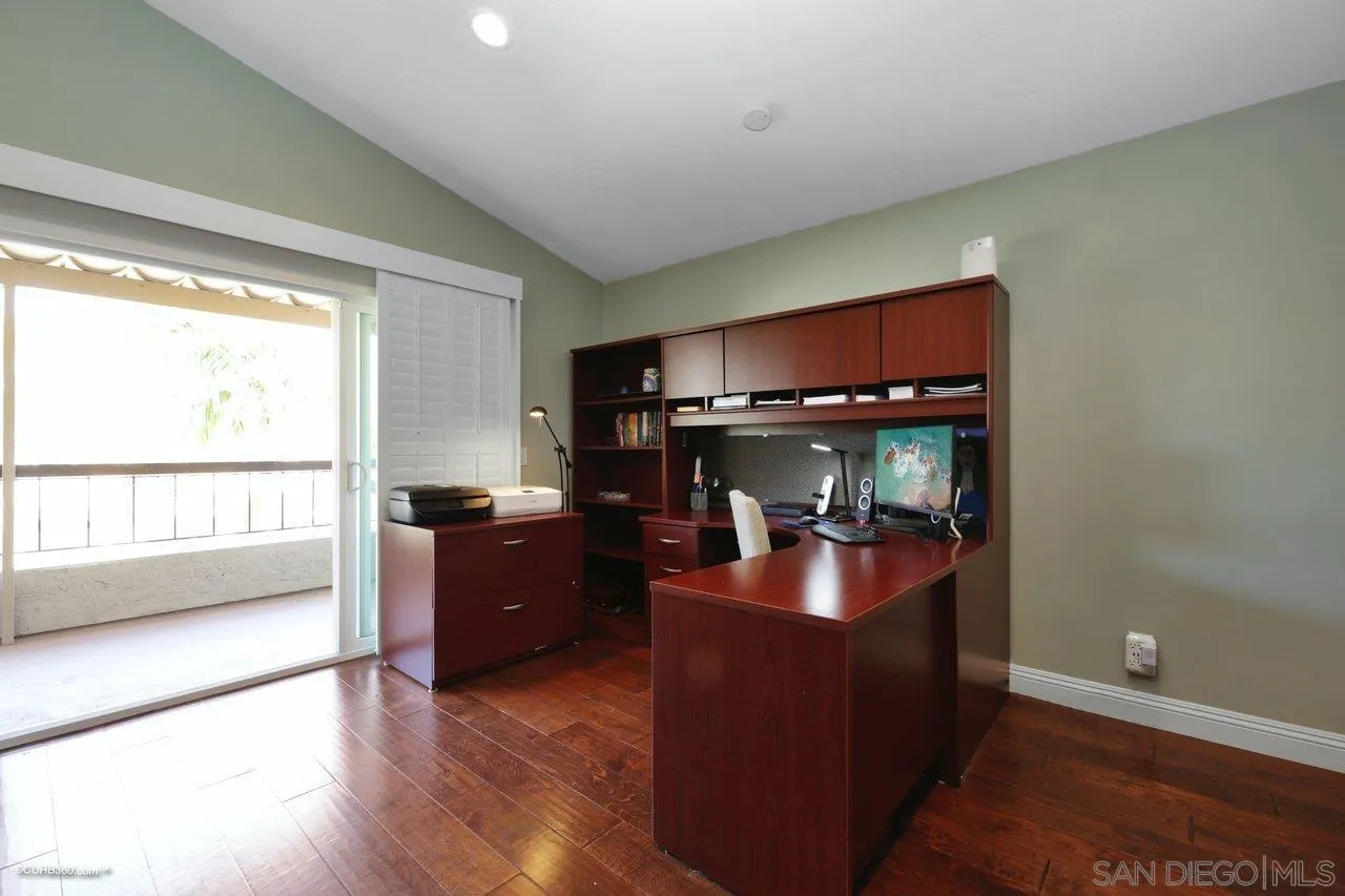 1540 Avenida De Las Lilas Encinitas, CA 92024 - Photo 23 of 39 a living room with furniture and a flat screen tv