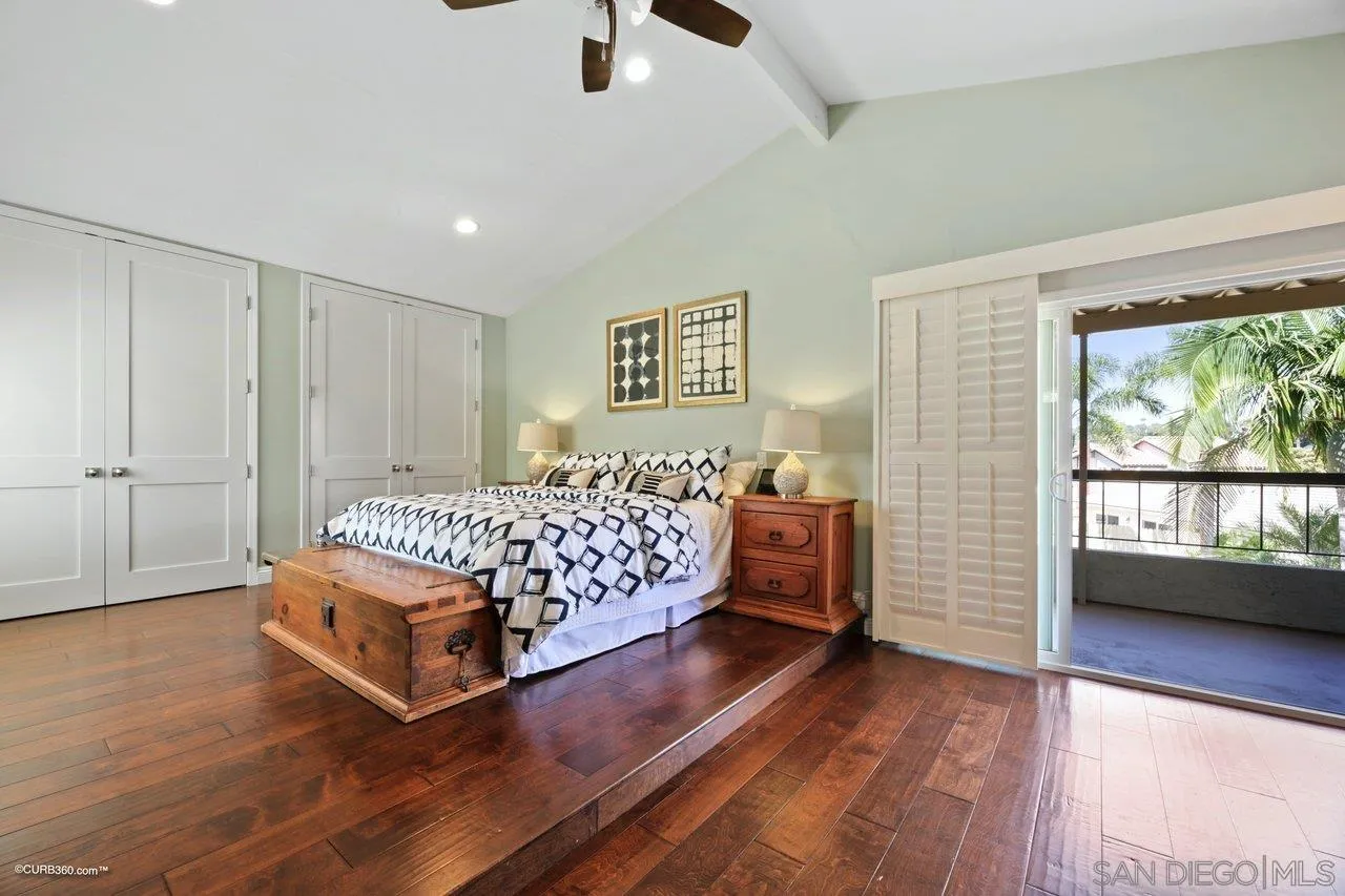 1540 Avenida De Las Lilas Encinitas, CA 92024 - Photo 24 of 39 a bedroom with a bed and large window