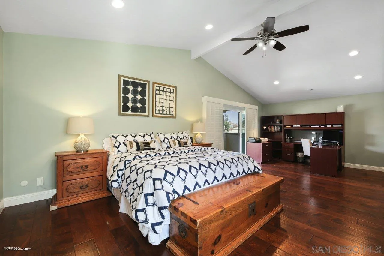 1540 Avenida De Las Lilas Encinitas, CA 92024 - Photo 25 of 39 a bed room with a bed window and couch