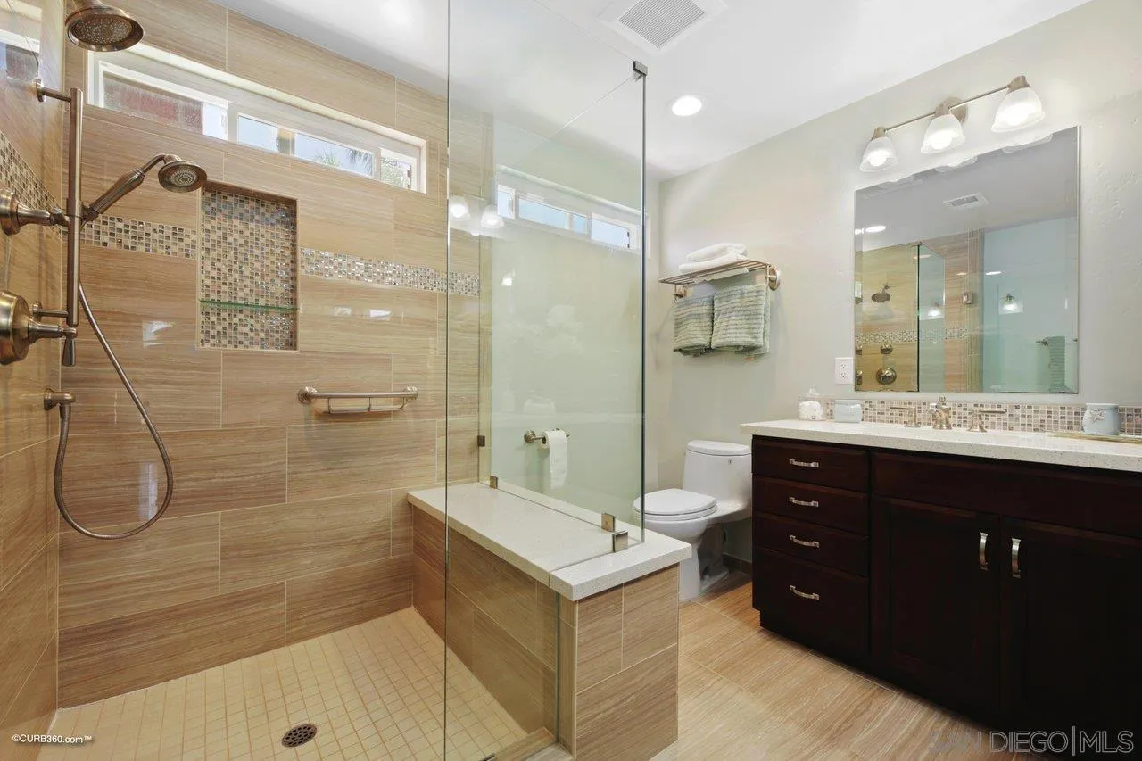 1540 Avenida De Las Lilas Encinitas, CA 92024 - Photo 30 of 39 a bathroom with a double vanity sink mirror and shower