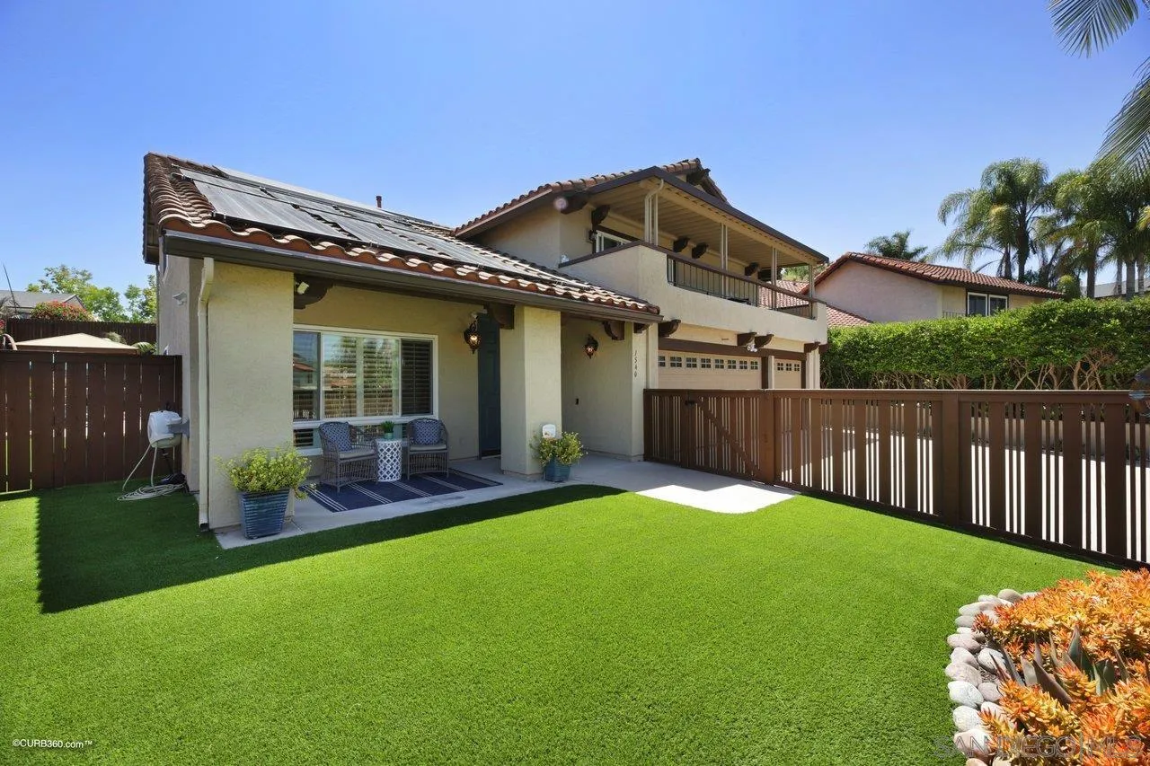 1540 Avenida De Las Lilas Encinitas, CA 92024 - Photo 3 of 39 a view of a house with a yard and furniture