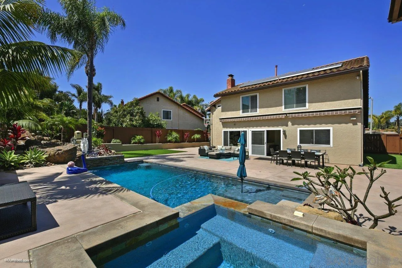 1540 Avenida De Las Lilas Encinitas, CA 92024 - Photo 34 of 39 a front view of a house with swimming pool having outdoor seating