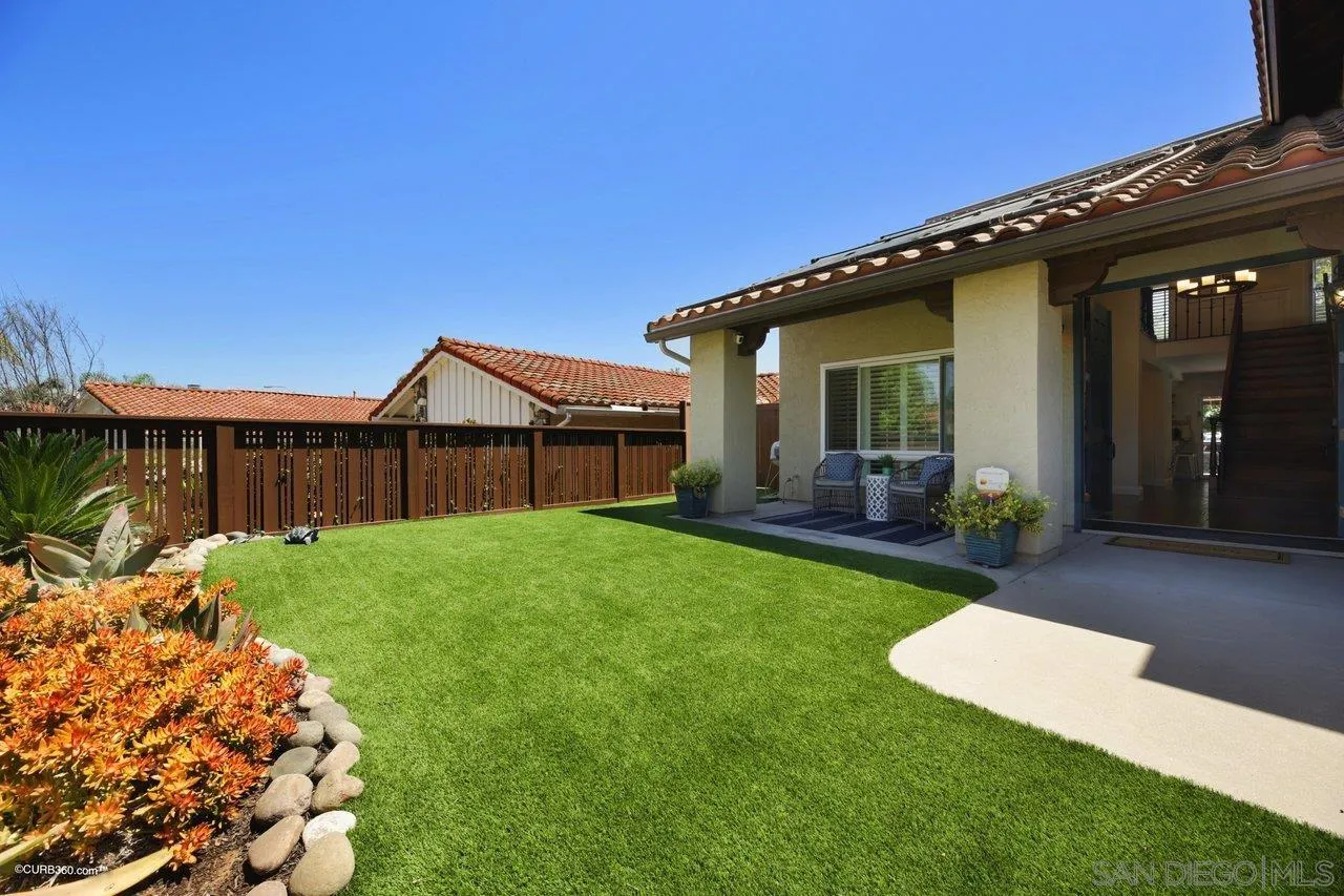 1540 Avenida De Las Lilas Encinitas, CA 92024 - Photo 5 of 39 a view of a house with backyard and porch