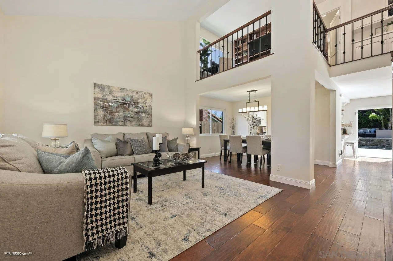 1540 Avenida De Las Lilas Encinitas, CA 92024 - Photo 7 of 39 a living room with furniture and wooden floor