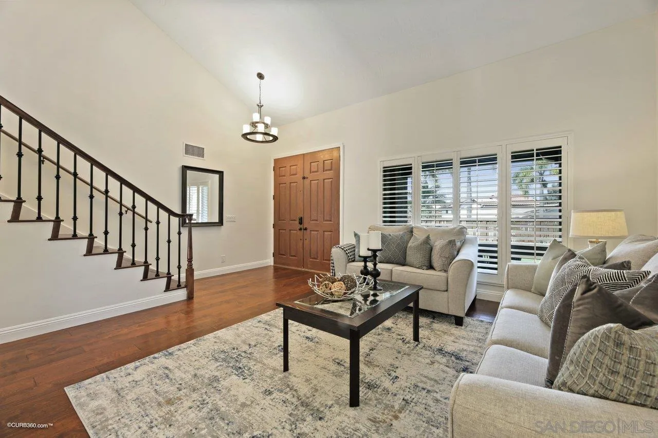 1540 Avenida De Las Lilas Encinitas, CA 92024 - Photo 9 of 39 a living room with furniture windows and a table