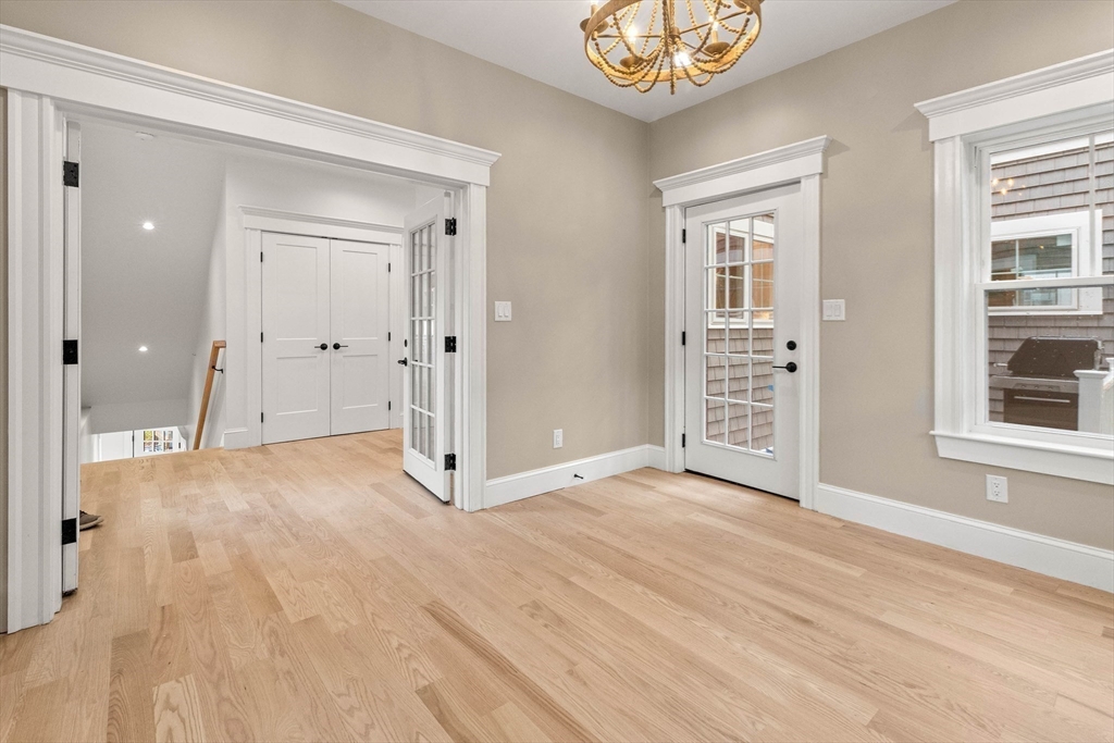 116 East Main Street, Unit 8 Gloucester, MA 01930 - Photo 11 of 31 a view of an empty room with a window