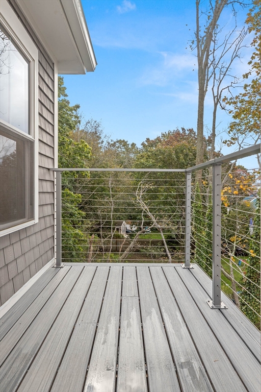 116 East Main Street, Unit 8 Gloucester, MA 01930 - Photo 15 of 31 a view of balcony with wooden floor and outdoor space