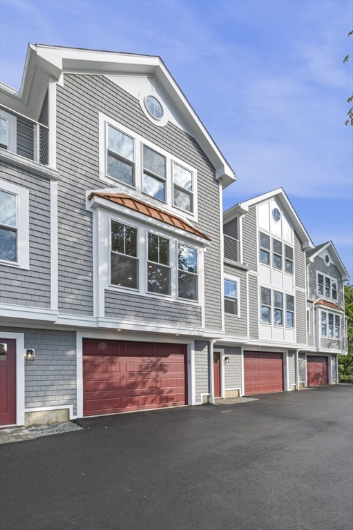 116 East Main Street, Unit 8 Gloucester, MA 01930 - Photo 26 of 31 a front view of a building with a street
