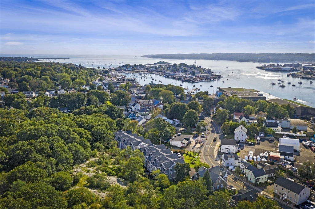116 East Main Street, Unit 8 Gloucester, MA 01930 - Photo 29 of 31 an aerial view of multiple house with yard