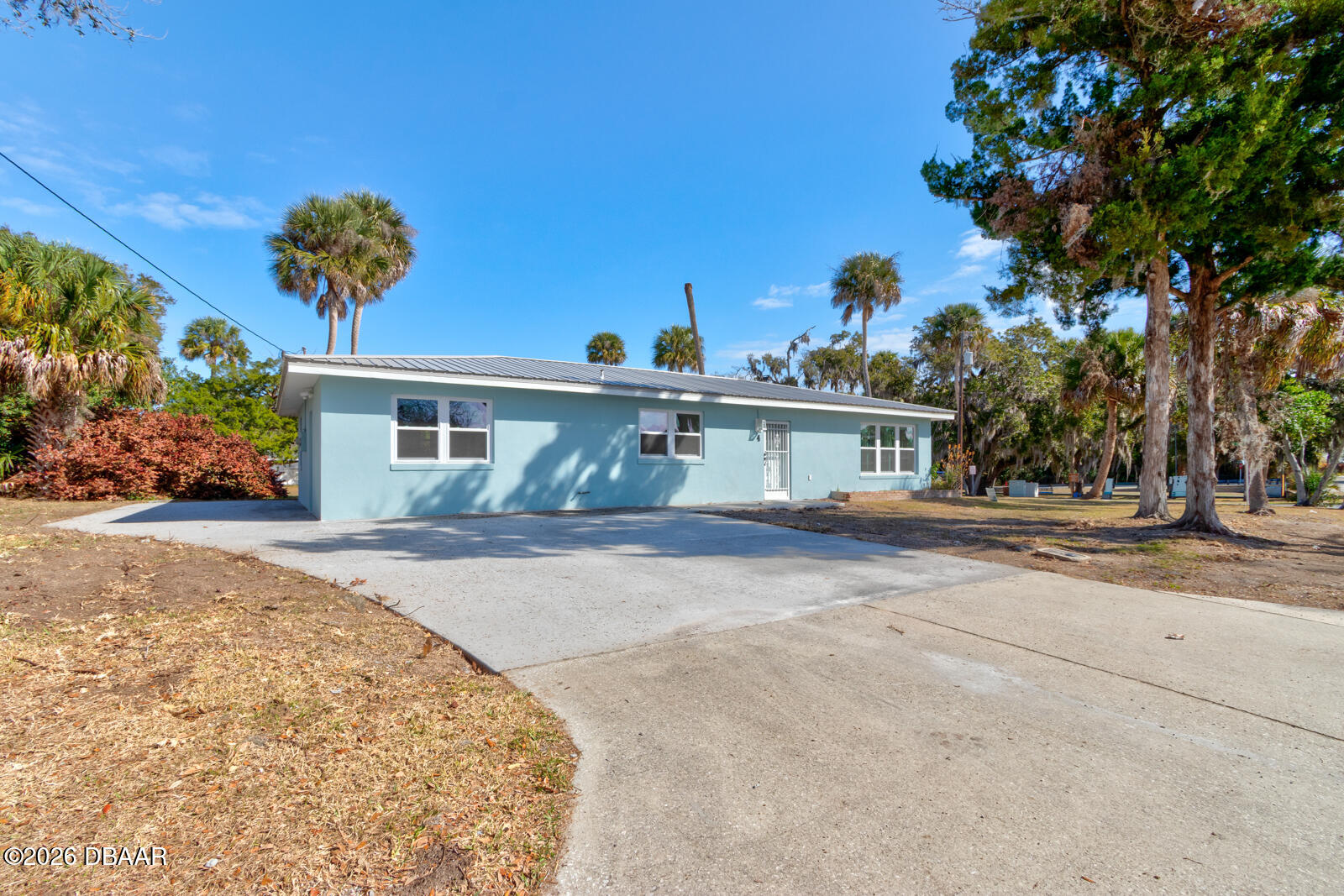 4 Main Street Port Orange, FL 32127 - Photo 2 of 17 front view of a house with a street