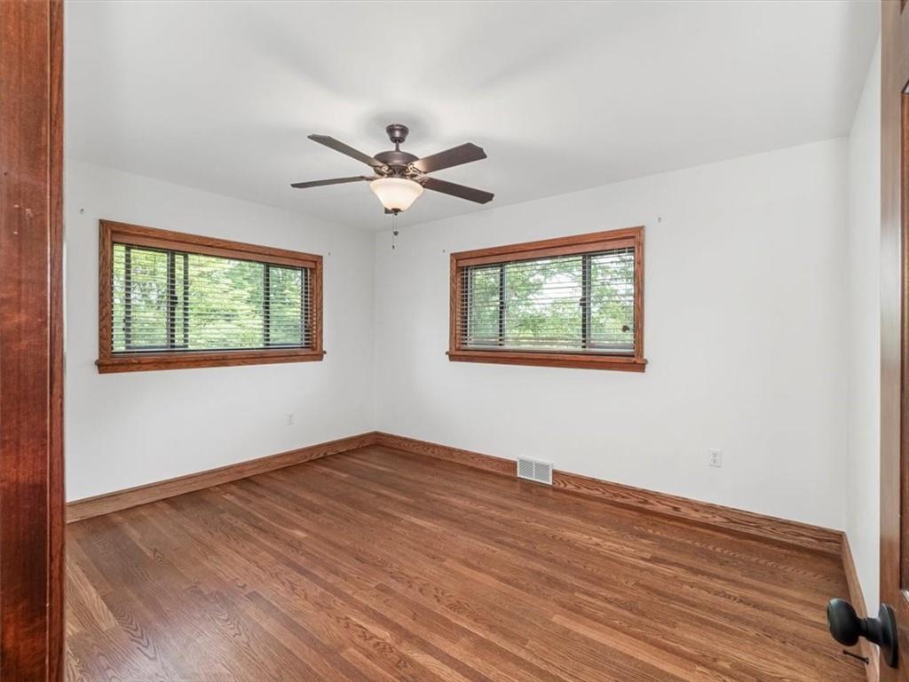 330 Center Grange Road Monaca, PA 15061 - Photo 11 of 42 a view of empty room with wooden floor and fan