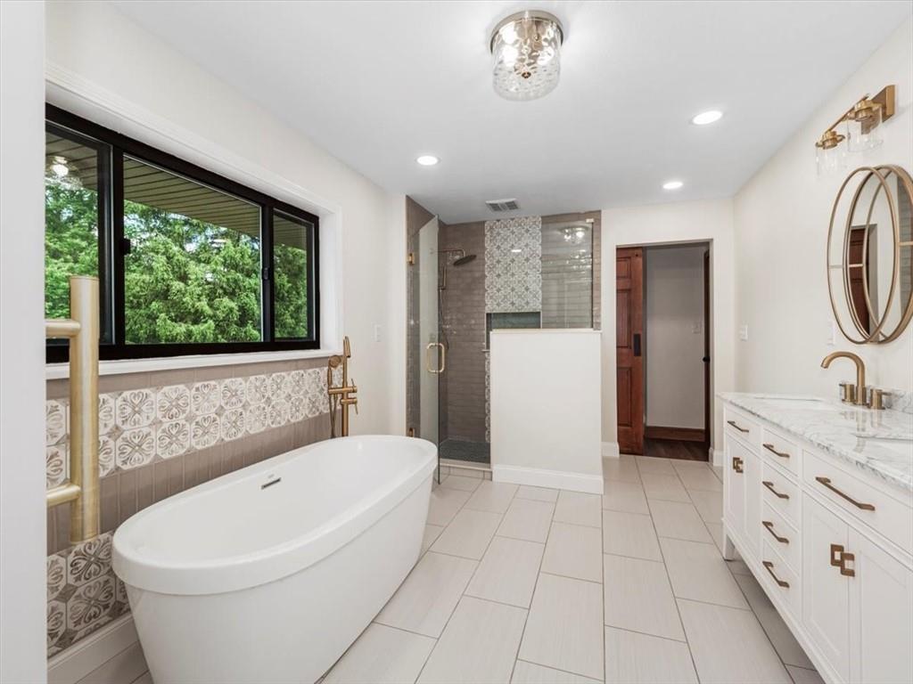 330 Center Grange Road Monaca, PA 15061 - Photo 17 of 42 a spacious bathroom with a large tub shower and sink