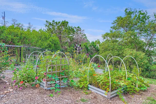 a view of a house with a street