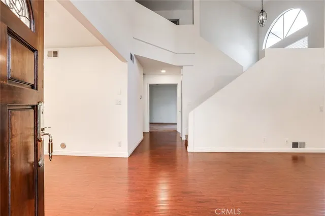 a view of a livingroom with wooden floor