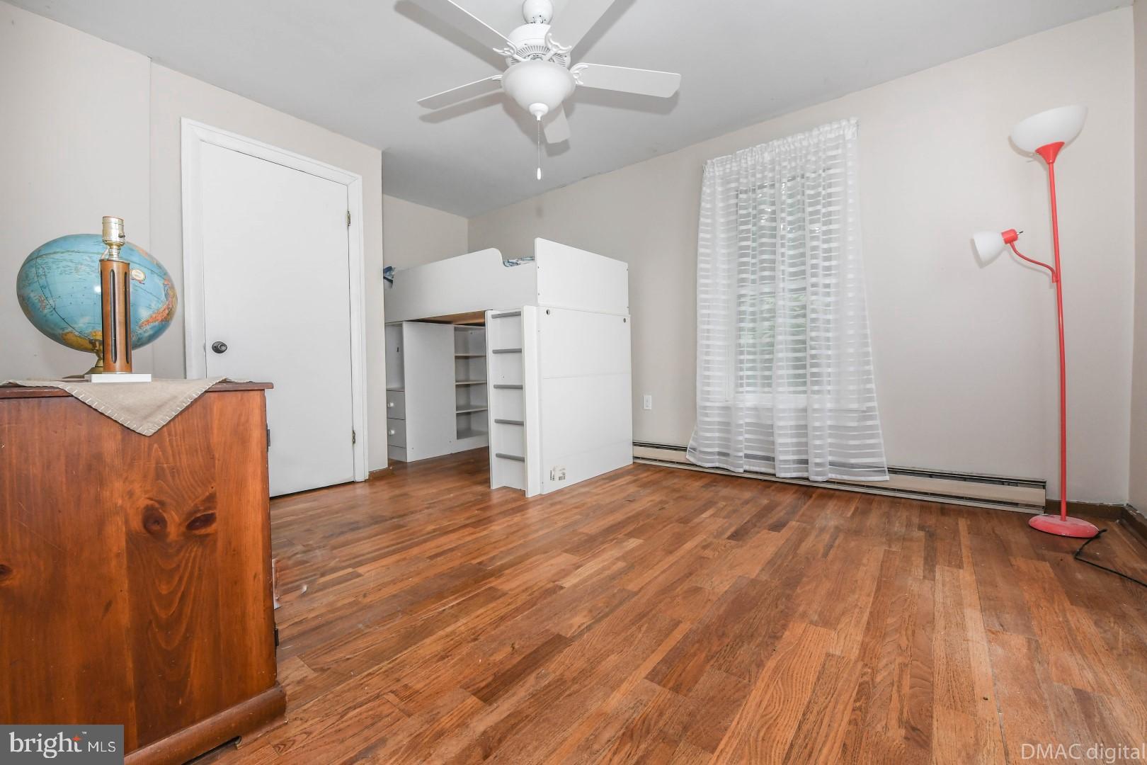 12512 Rockdale Road Clear Spring, MD 21722 - Photo 23 of 31 wooden floor in an empty room with a window