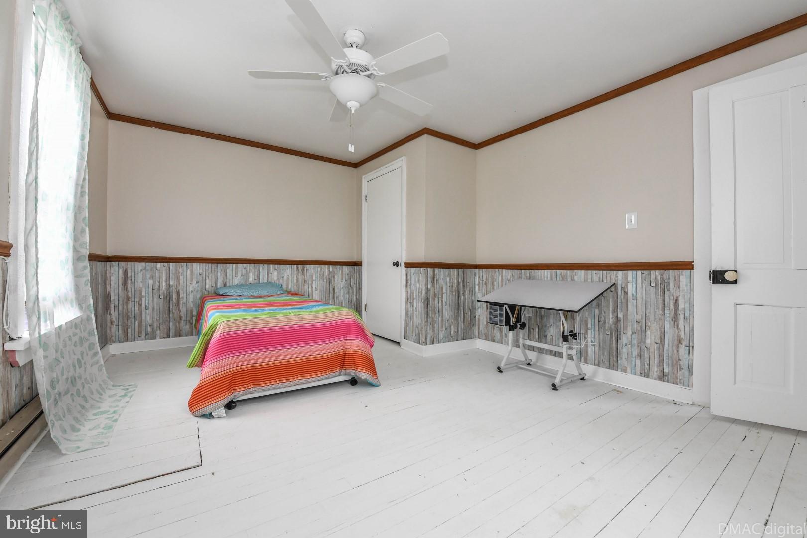 12512 Rockdale Road Clear Spring, MD 21722 - Photo 27 of 31 a bedroom with a bed and a chandelier